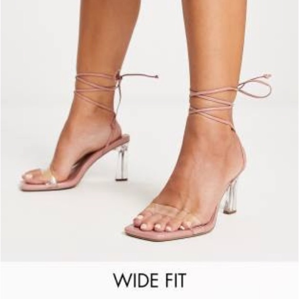 ASOS DESIGN Wide Fit Helsy tie leg mid heeled sandals in clear and beige
